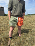 Load image into Gallery viewer, Duo Rugby Shorts- Olive and Orange

